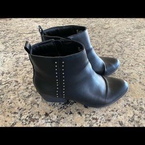 Black studded heeled boots